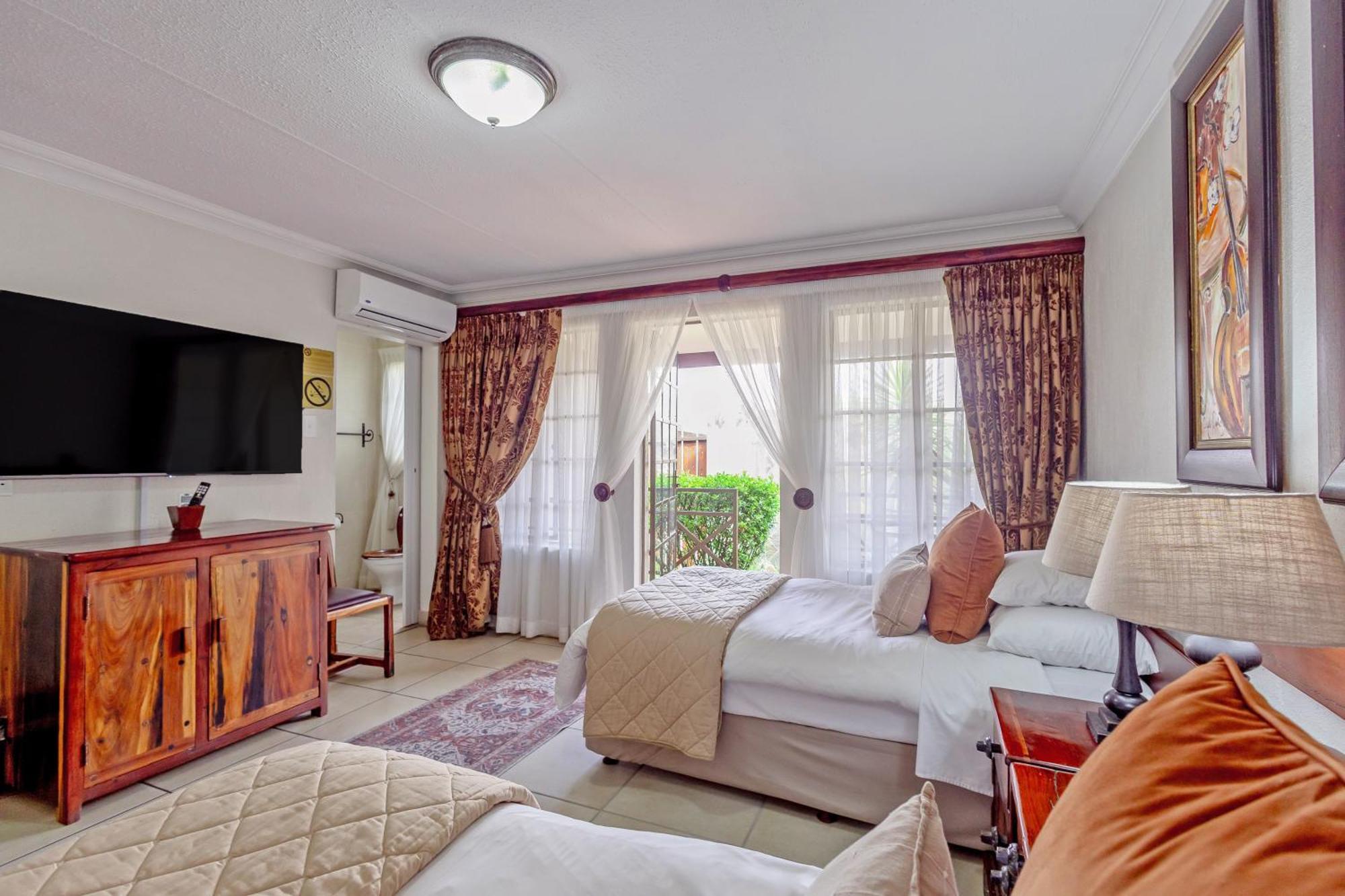 Afrique Boutique Hotel O.R. Tambo Boksburg Rom bilde